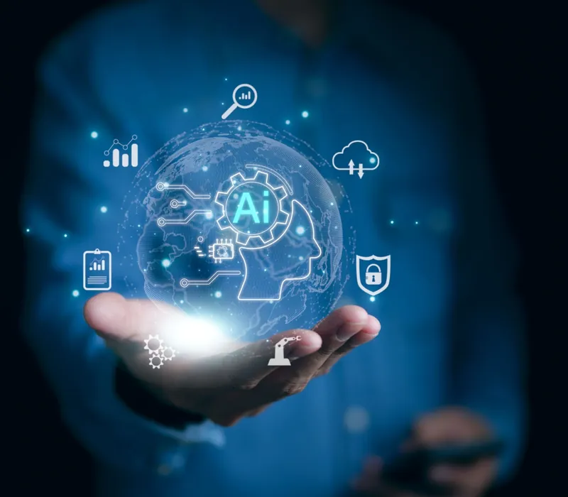 Mano sosteniendo una esfera holográfica con iconos de inteligencia artificial